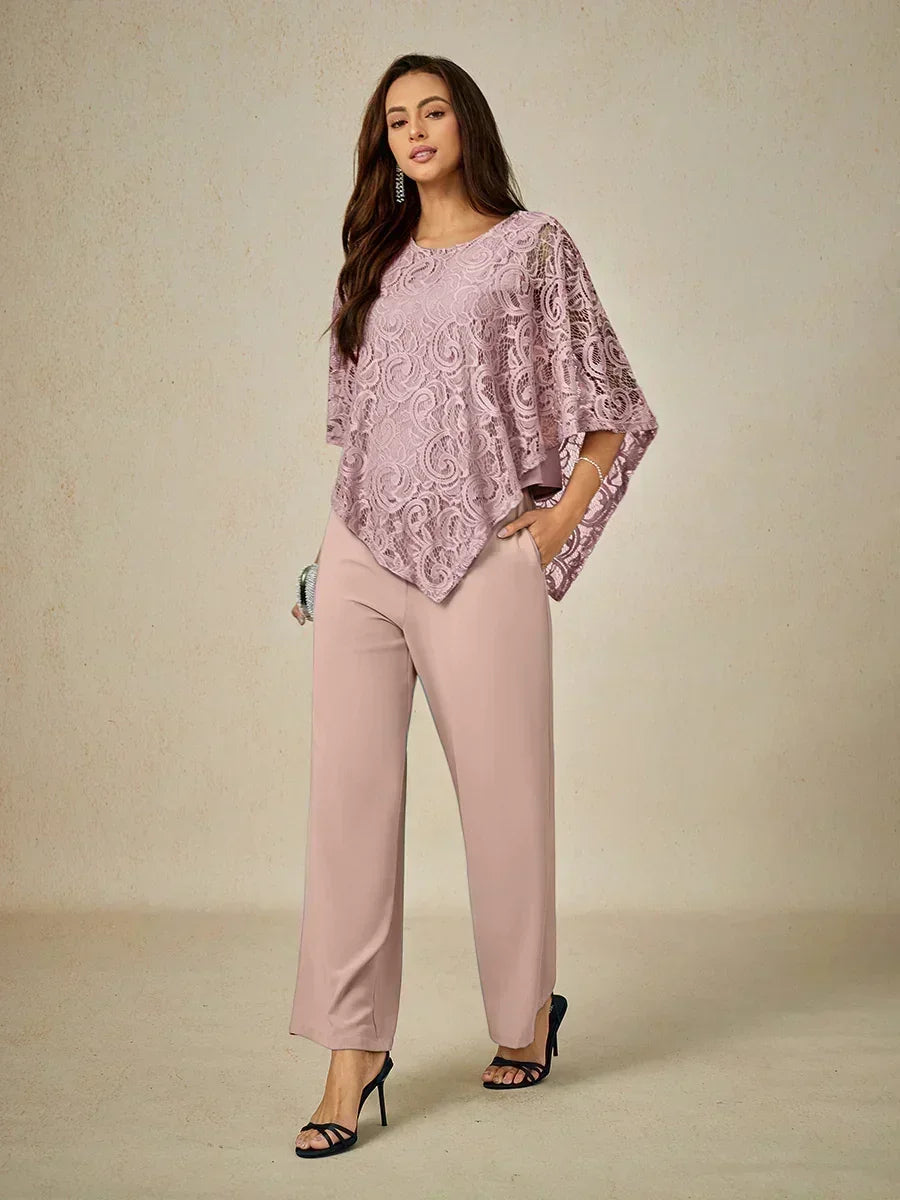 Top elegante in pizzo con maniche a pipistrello