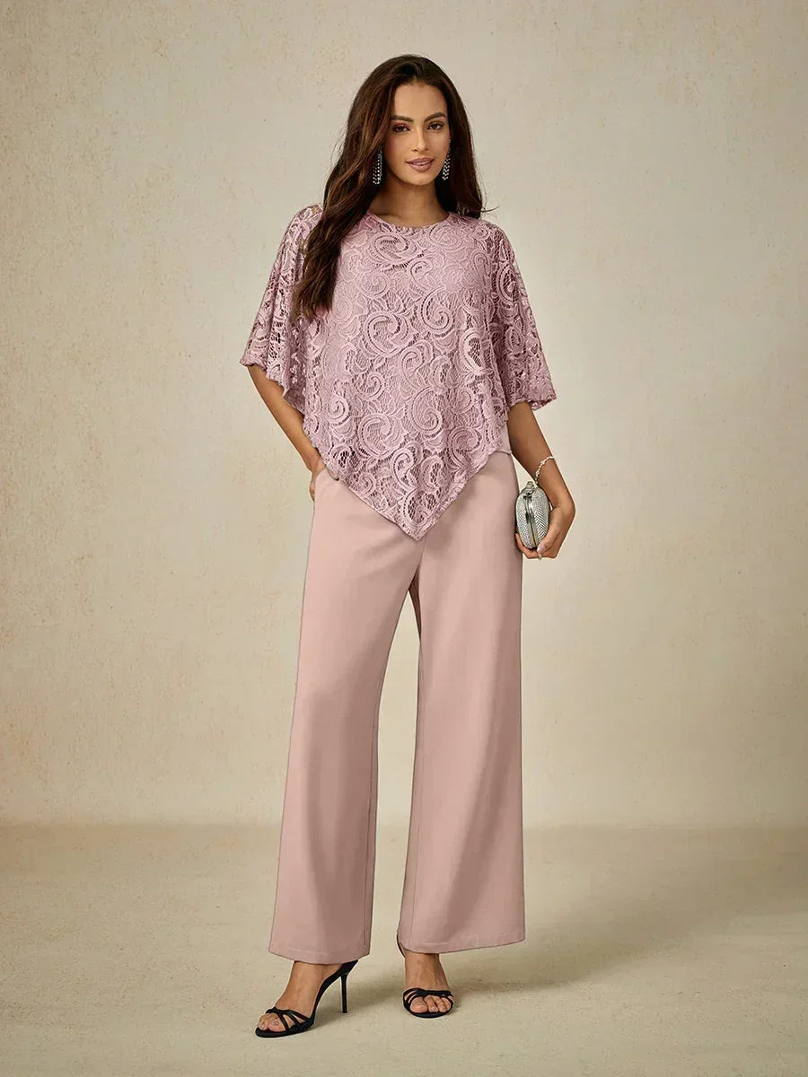 Top elegante in pizzo con maniche a pipistrello