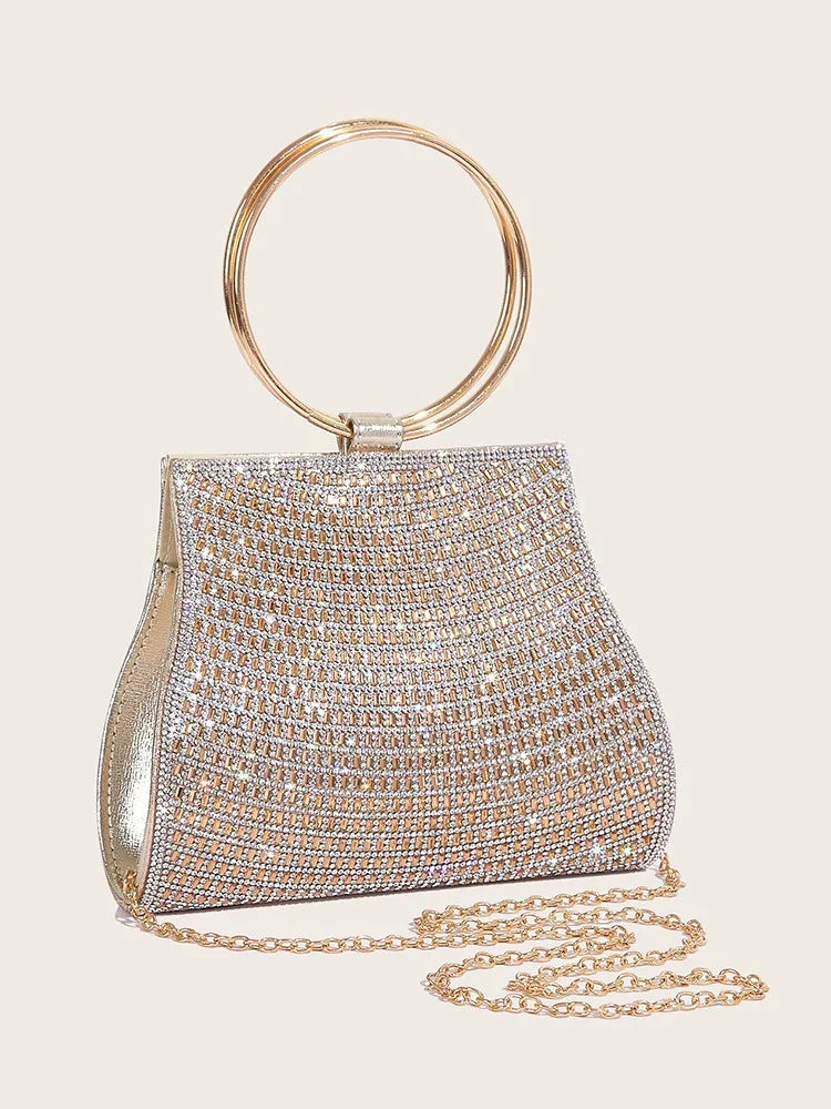 Kristall-Clutch mit goldenem Ringgriff, elegante Tasche
