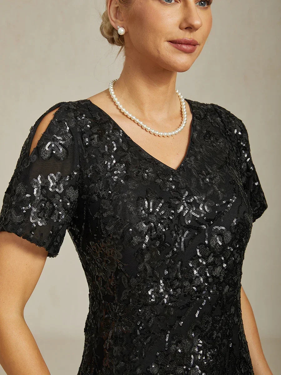 Elegantes Paillettenkleid mit V-Ausschnitt und kalten Schultern