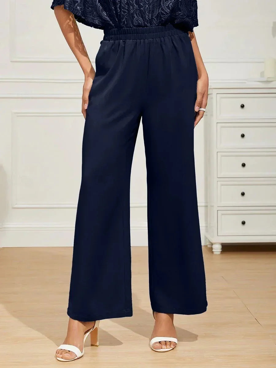 Pantaloni a gamba larga con vita elasticizzata a metà altezza e tasche