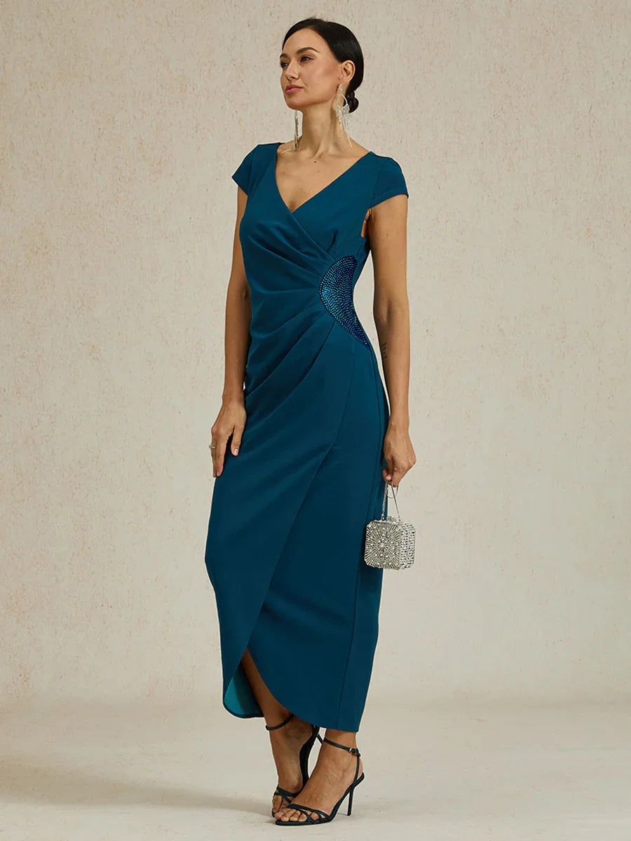 Elegante wikkeljurk met strasssteentjes