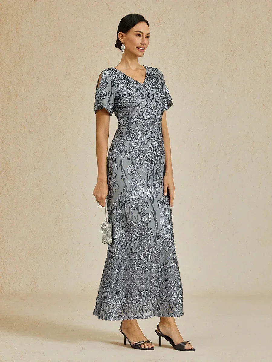 Elegantes Paillettenkleid mit V-Ausschnitt und kalten Schultern