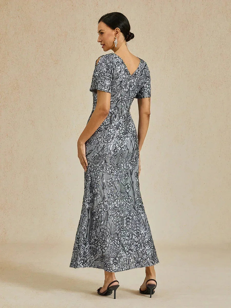 Elegantes Paillettenkleid mit V-Ausschnitt und kalten Schultern
