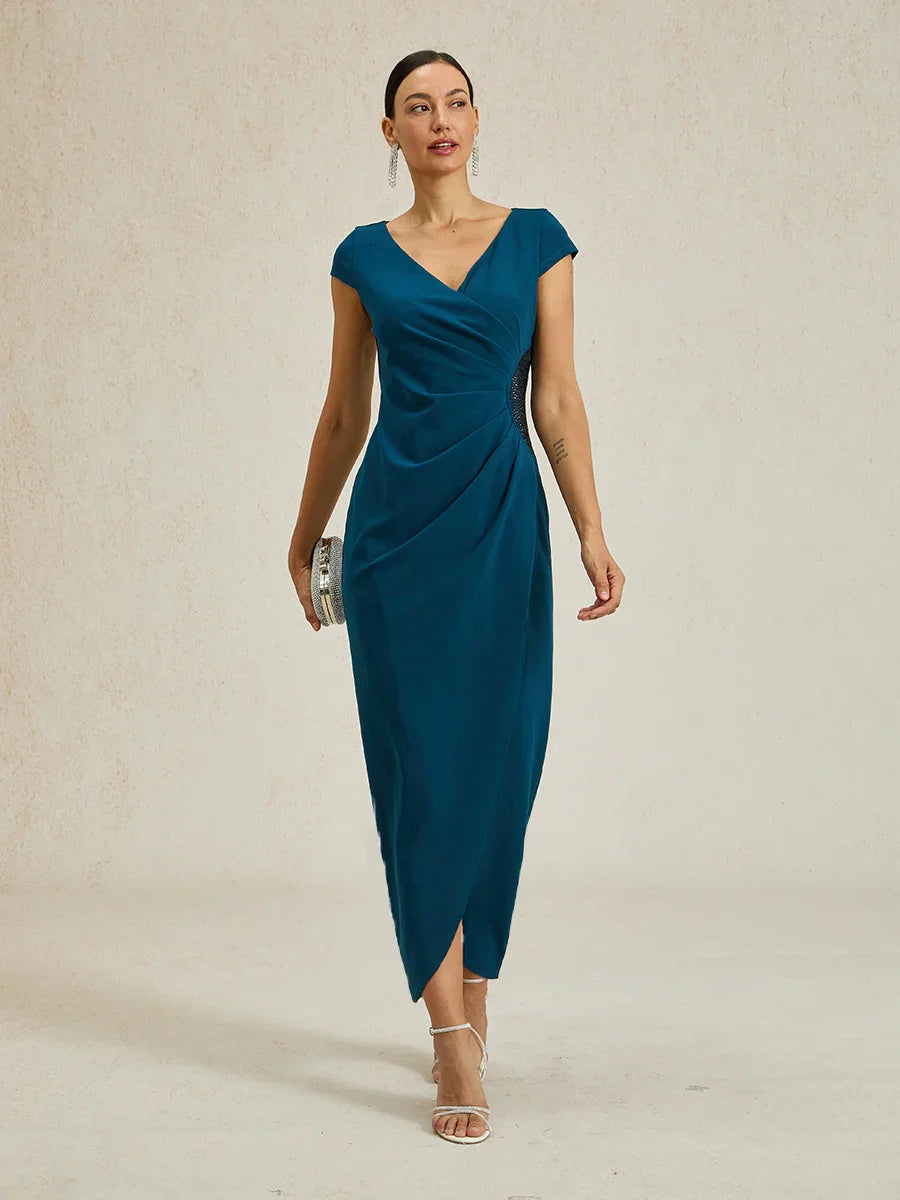 Elegante wikkeljurk met strasssteentjes
