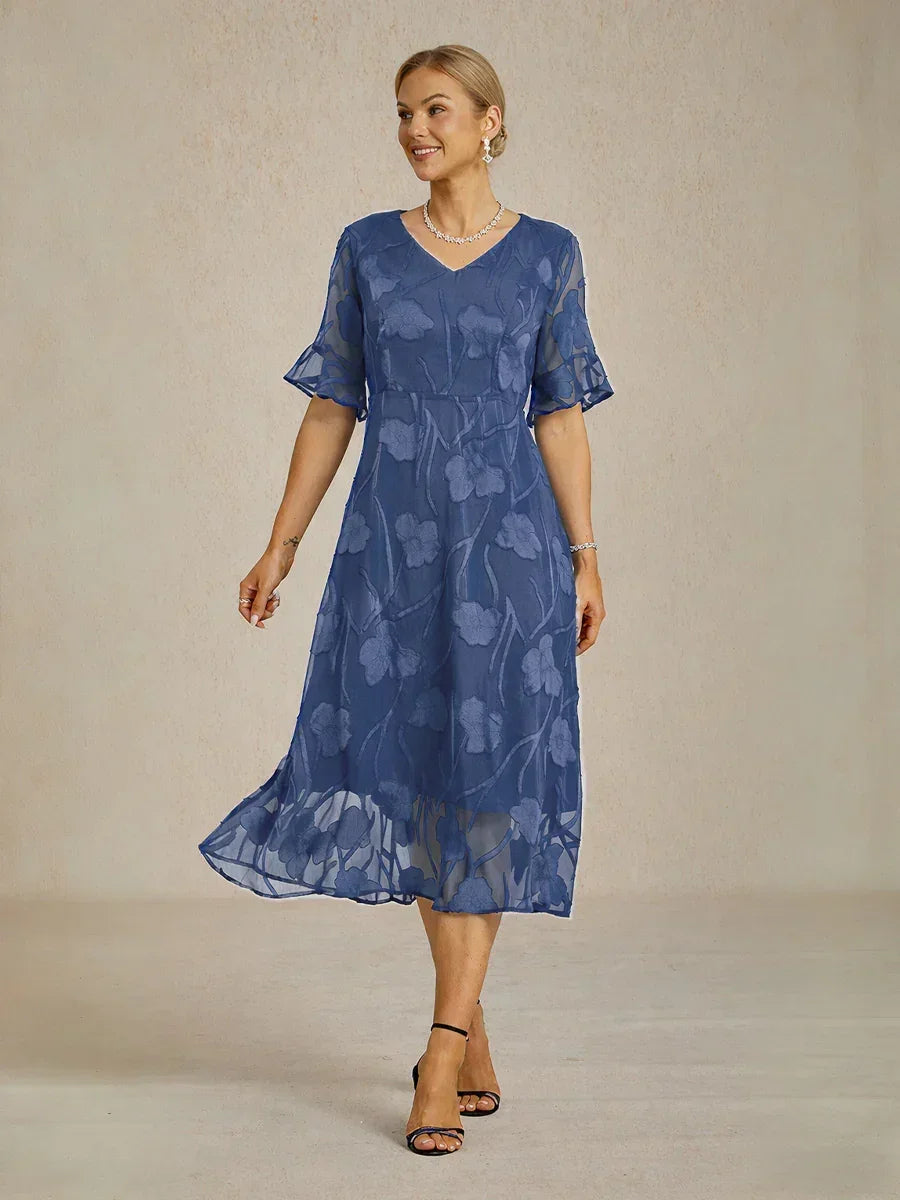 Maxikleid aus Spitze mit Rüschen und Flatterärmeln