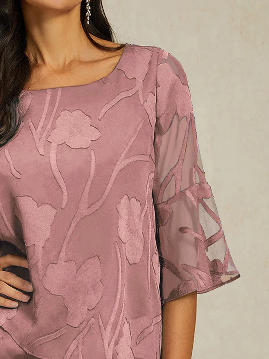 Elegante Chiffonbluse mit asymmetrischem Saum