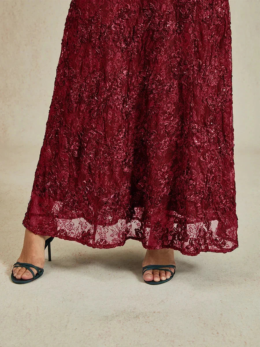 Abito a linea A con pizzo a rosetta e decorazioni in paillettes