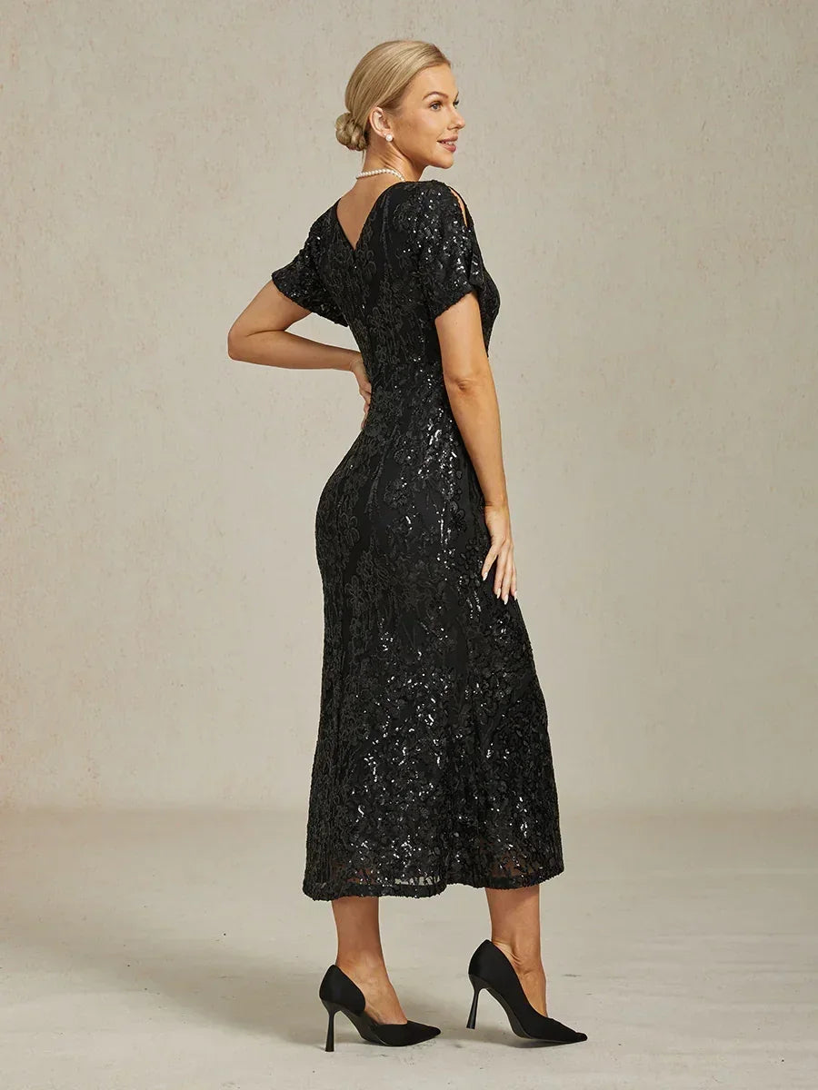 Elegantes Paillettenkleid mit V-Ausschnitt und kalten Schultern