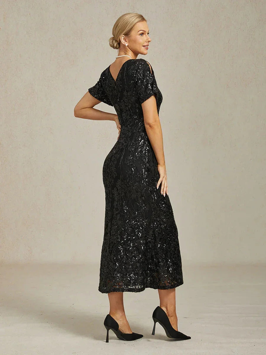 Elegantes Paillettenkleid mit V-Ausschnitt und kalten Schultern