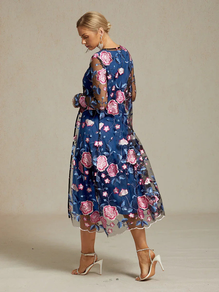 Veste longue en dentelle brodée de fleurs
