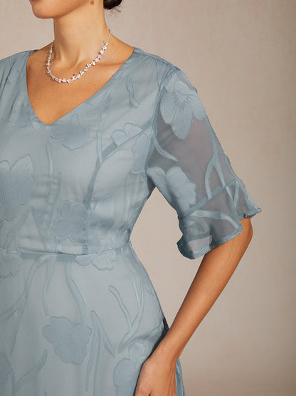 Maxikleid mit Rüschen und flatternder Spitze