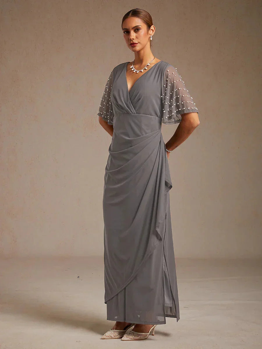 Elegantes Abendkleid mit verzierten Volantärmeln