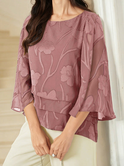 Chiffonbluse med blomster og lagvis design