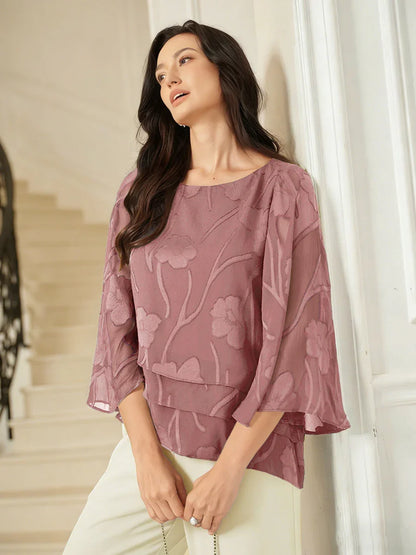 Chiffonbluse med blomster og lagvis design