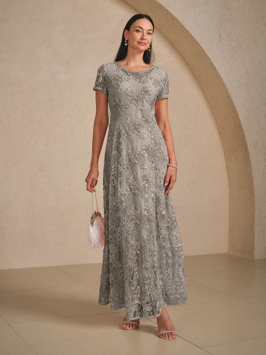 Abito a linea A con pizzo a rosetta e decorazioni in paillettes