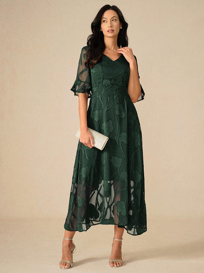 Robe longue en dentelle à volants