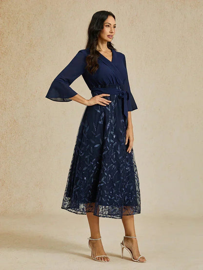 Robe midi en maille à paillettes bleu marine