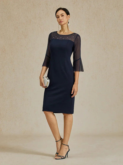 Elegante abito a tubino da cocktail con scollo in rete illusion decorata