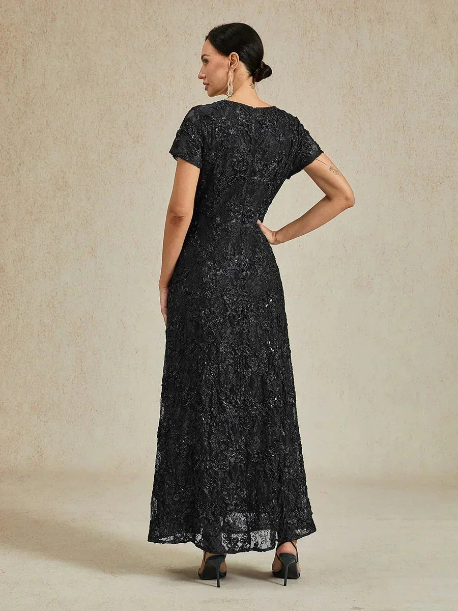 Abito a linea A con pizzo a rosetta e decorazioni in paillettes