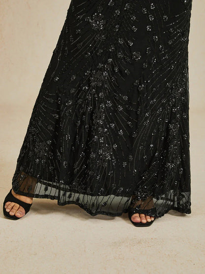 Robe fourreau à col en V et sequins perlés