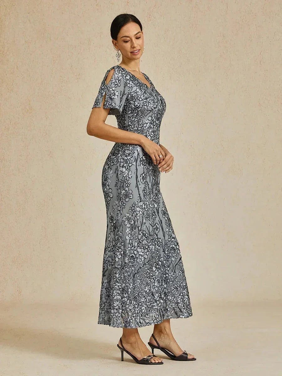 Vestito elegante con scollo a V, spalle scoperte e paillettes