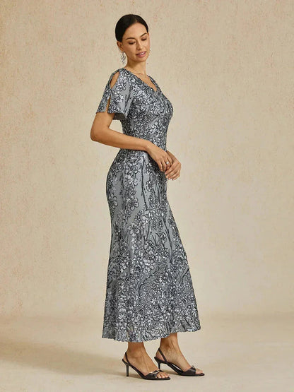 Vestito elegante con scollo a V, spalle scoperte e paillettes
