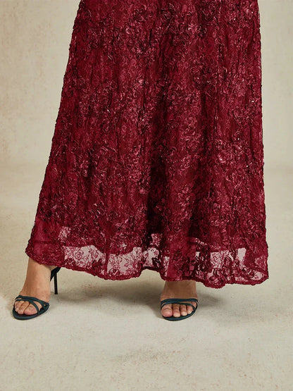 Abito a linea A con pizzo a rosetta e decorazioni in paillettes