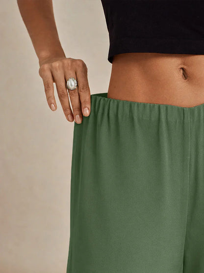 Pantaloni a gamba dritta con sovrapposizione in chiffon e spacco laterale