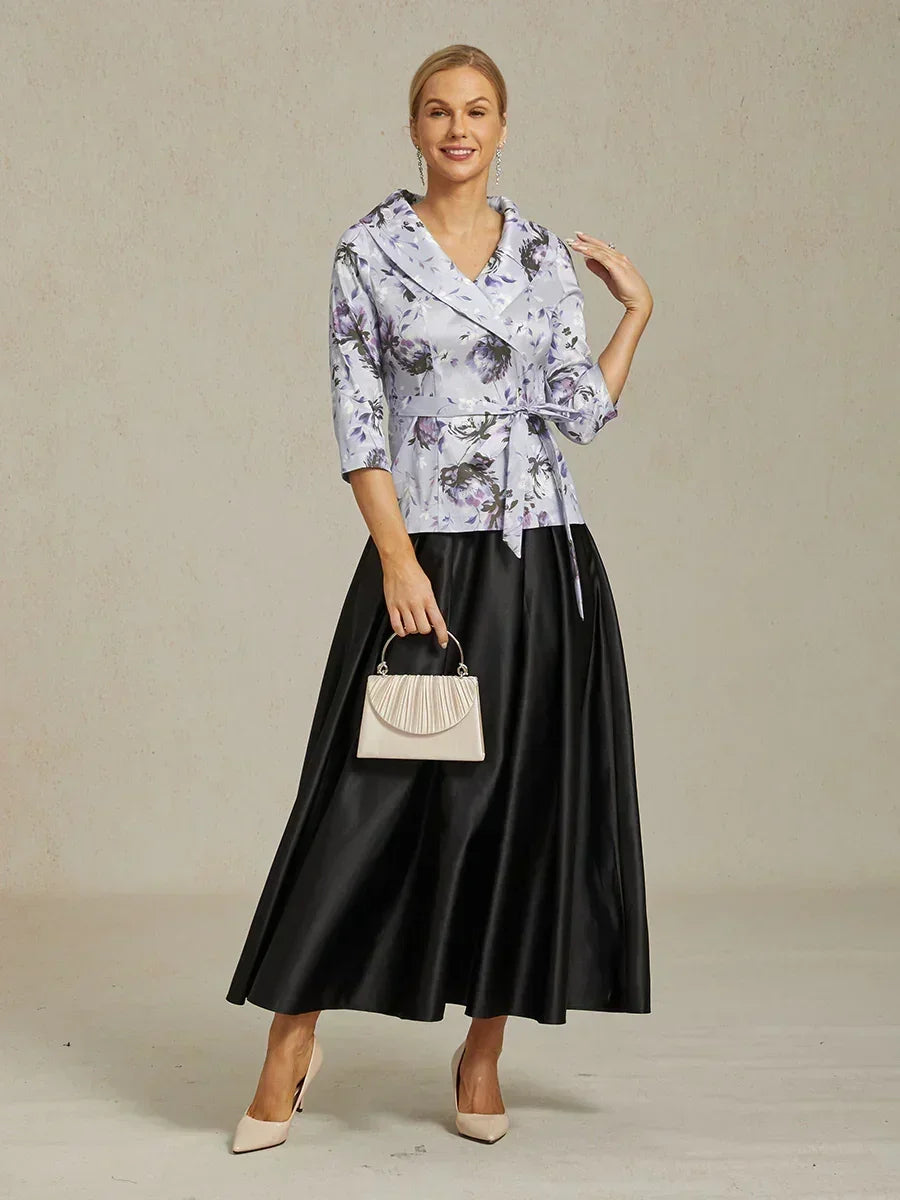 Blusa in taffetà elasticizzato con maniche 3/4 e dettaglio cintura annodata