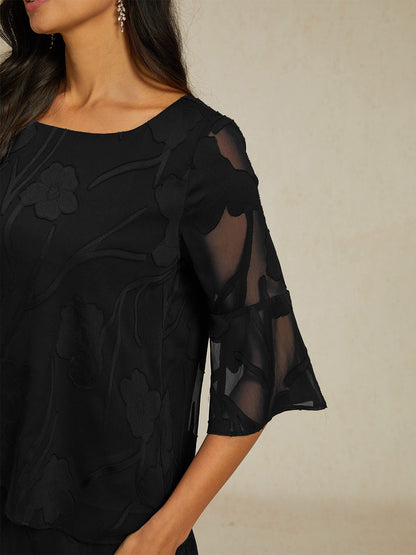 Elegante Chiffonbluse mit asymmetrischem Saum