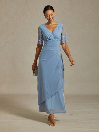 Elegantes Abendkleid mit verzierten Volantärmeln