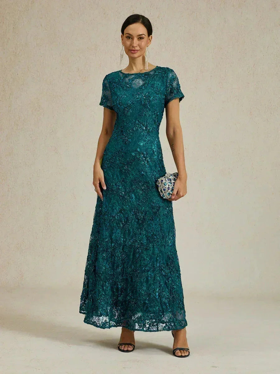 Abito a linea A con pizzo a rosetta e decorazioni in paillettes