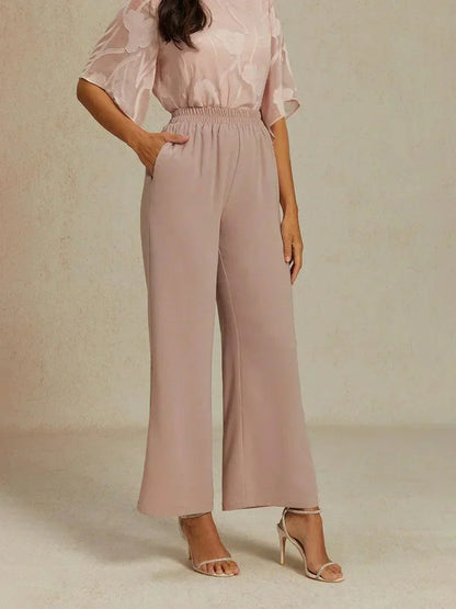 Weite Hose mit mittelhohem Bund und Taschen