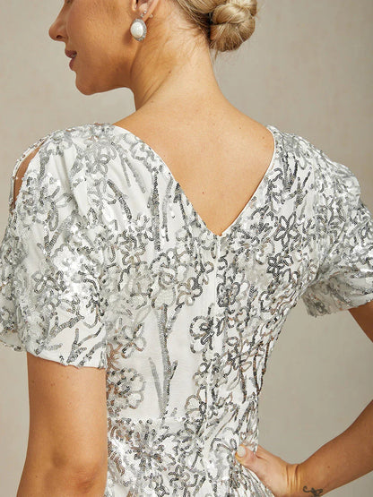 Vestito elegante con scollo a V, spalle scoperte e paillettes