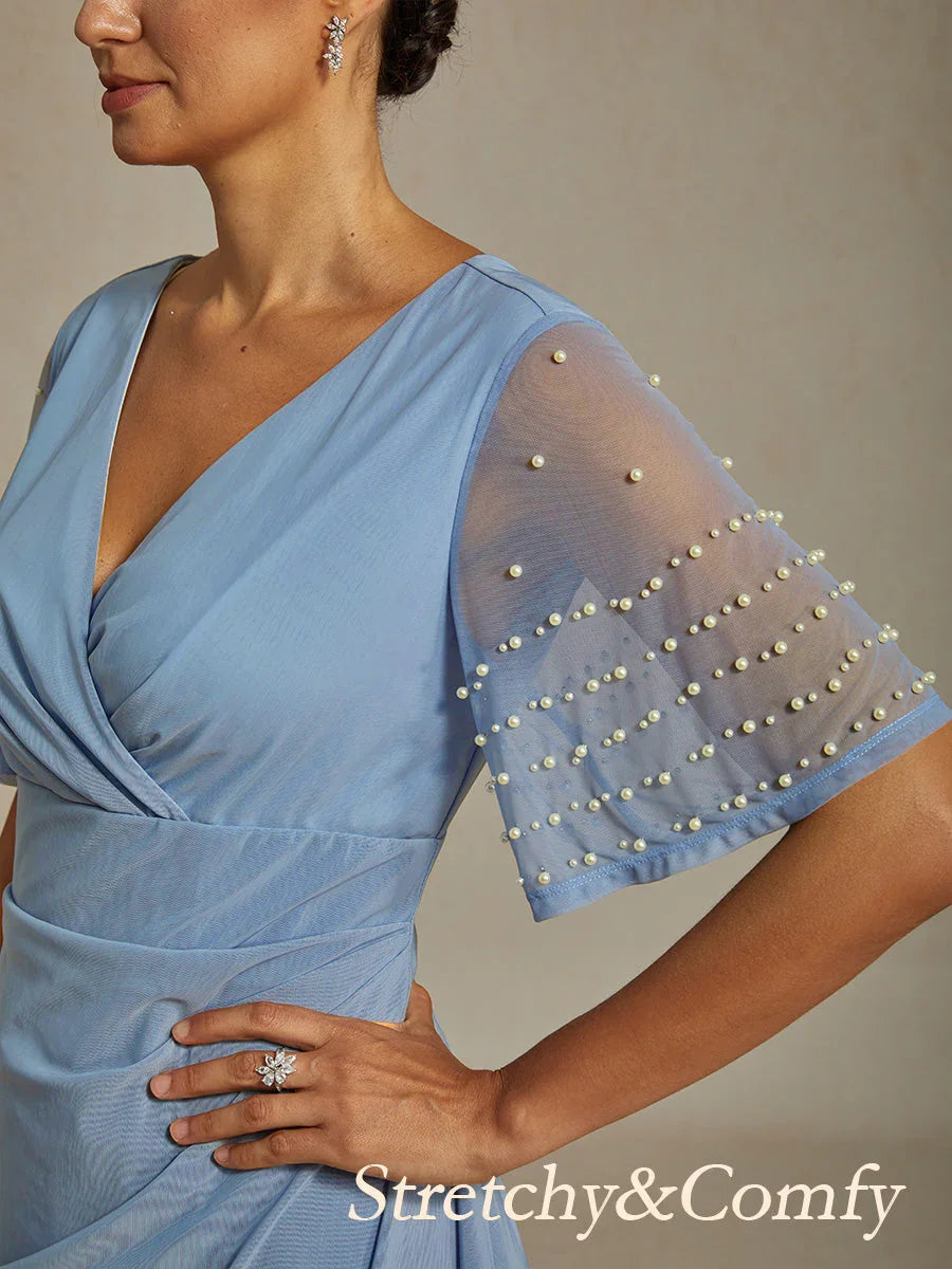 Elegantes Abendkleid mit verzierten Volantärmeln