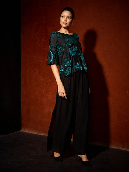 Elegante Bluse mit asymmetrischem Saum und Blumenmuster