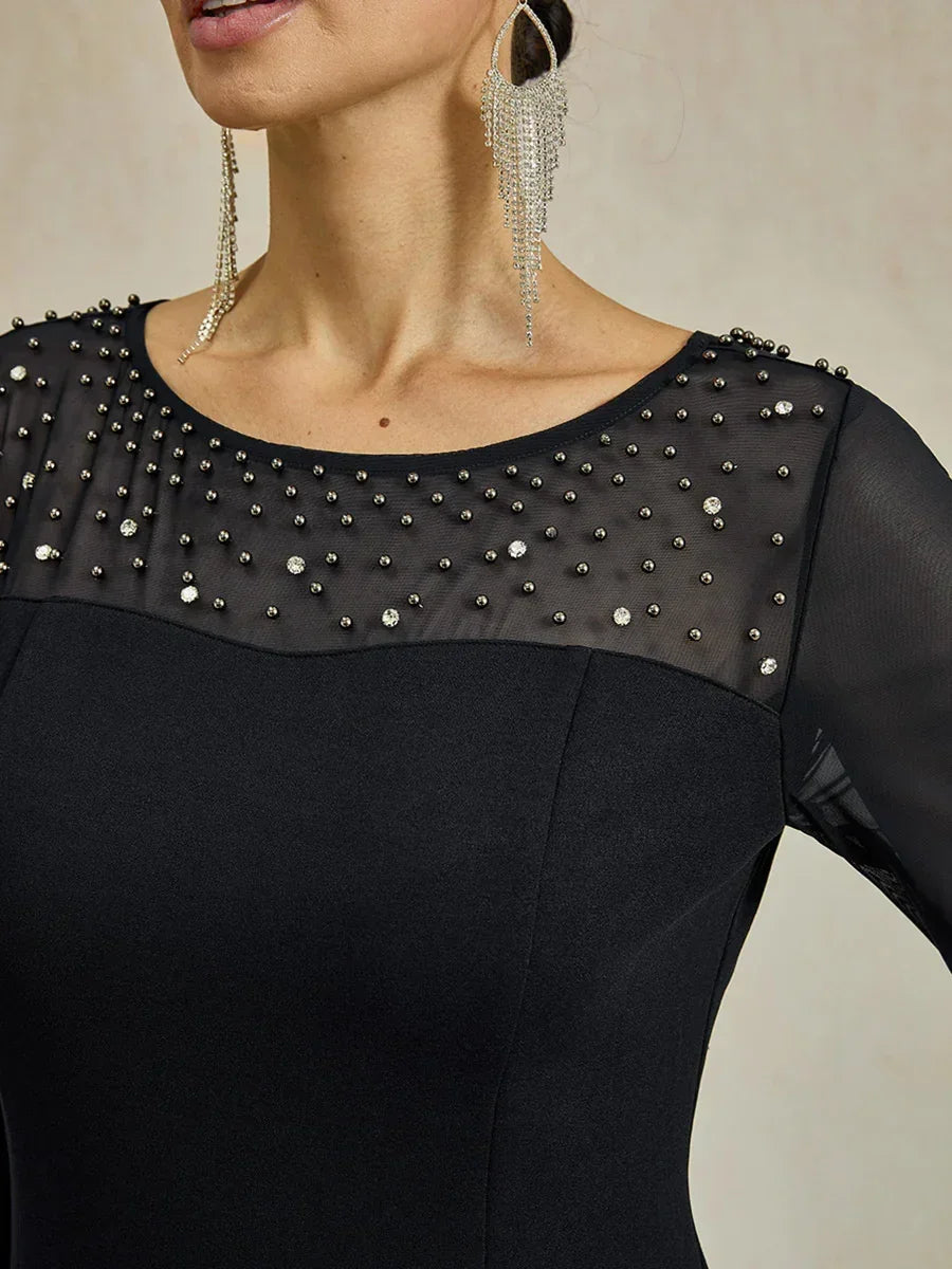 Elegante abito a tubino da cocktail con scollo in rete illusion decorata