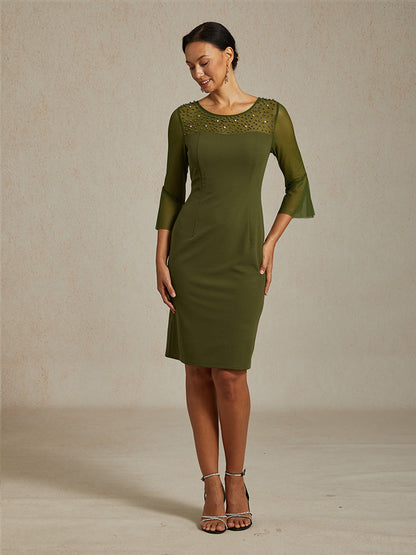 Elegante abito a tubino da cocktail con scollo in rete illusion decorata