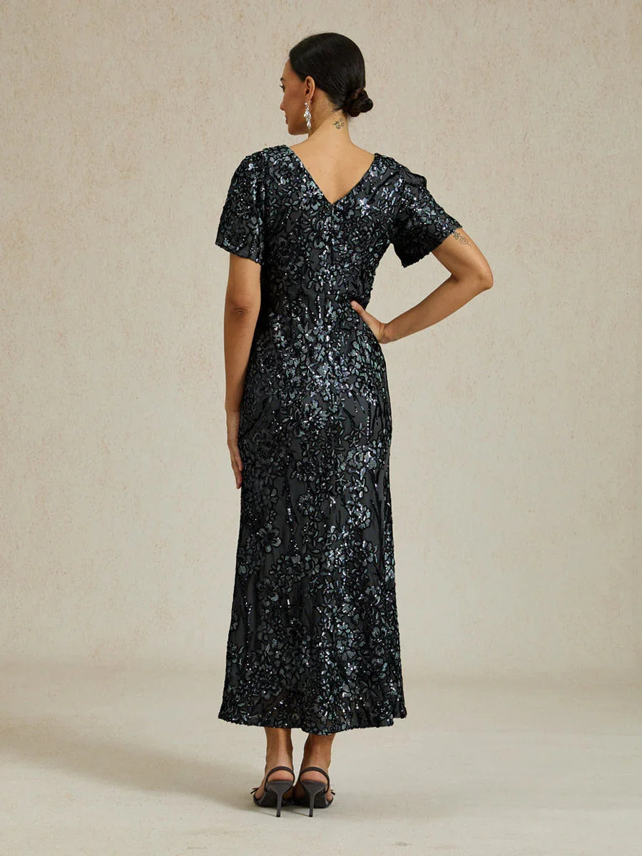 Vestito elegante con scollo a V, spalle scoperte e paillettes