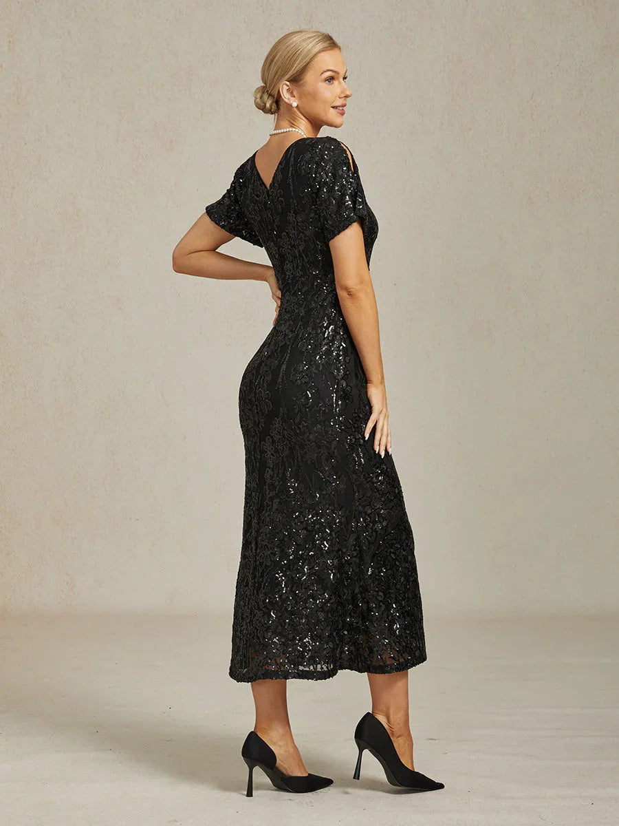 Vestito elegante con scollo a V, spalle scoperte e paillettes