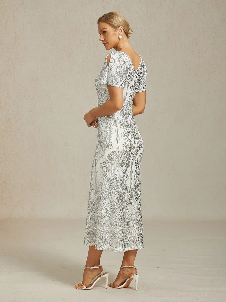 Vestito elegante con scollo a V, spalle scoperte e paillettes