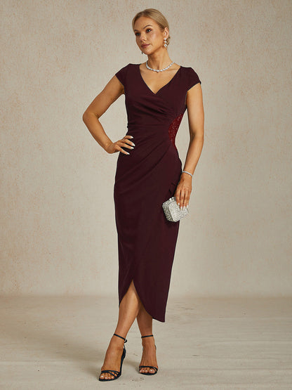 Elegante wikkeljurk met strasssteentjes