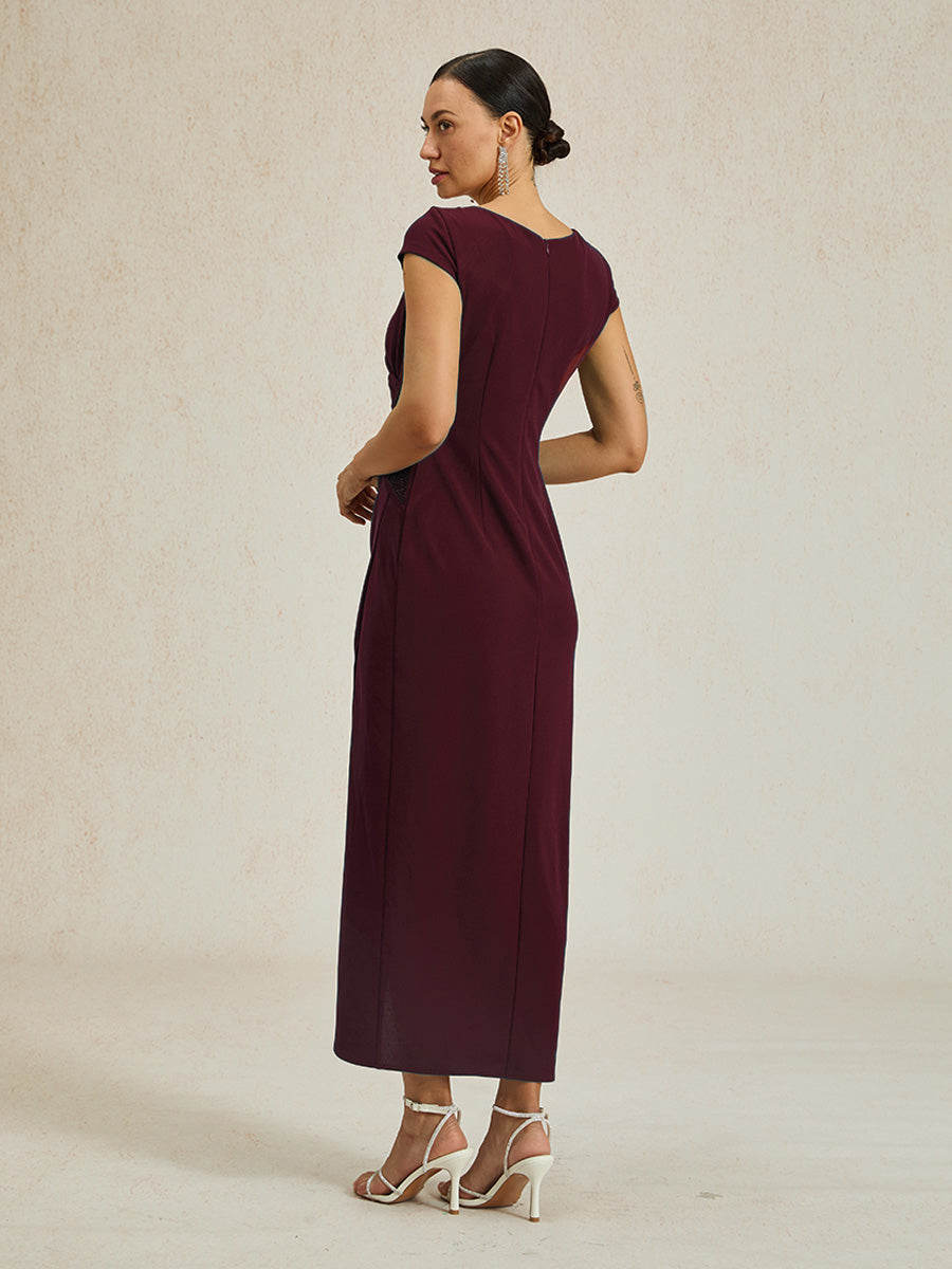 Elegante wikkeljurk met strasssteentjes