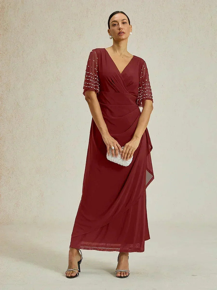 Elegantes Abendkleid mit verzierten Volantärmeln