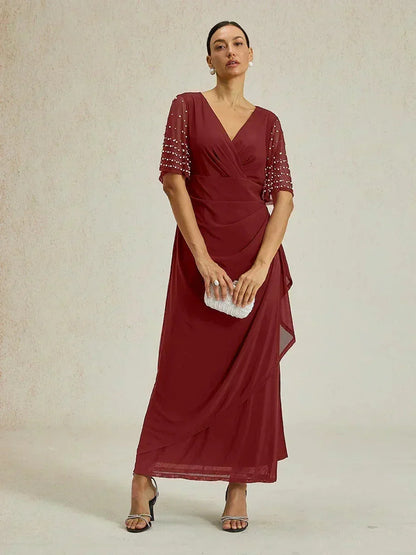 Elegantes Abendkleid mit verzierten Volantärmeln