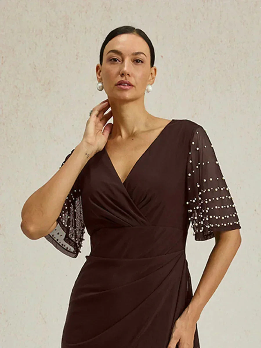 Elegantes Abendkleid mit verzierten Volantärmeln