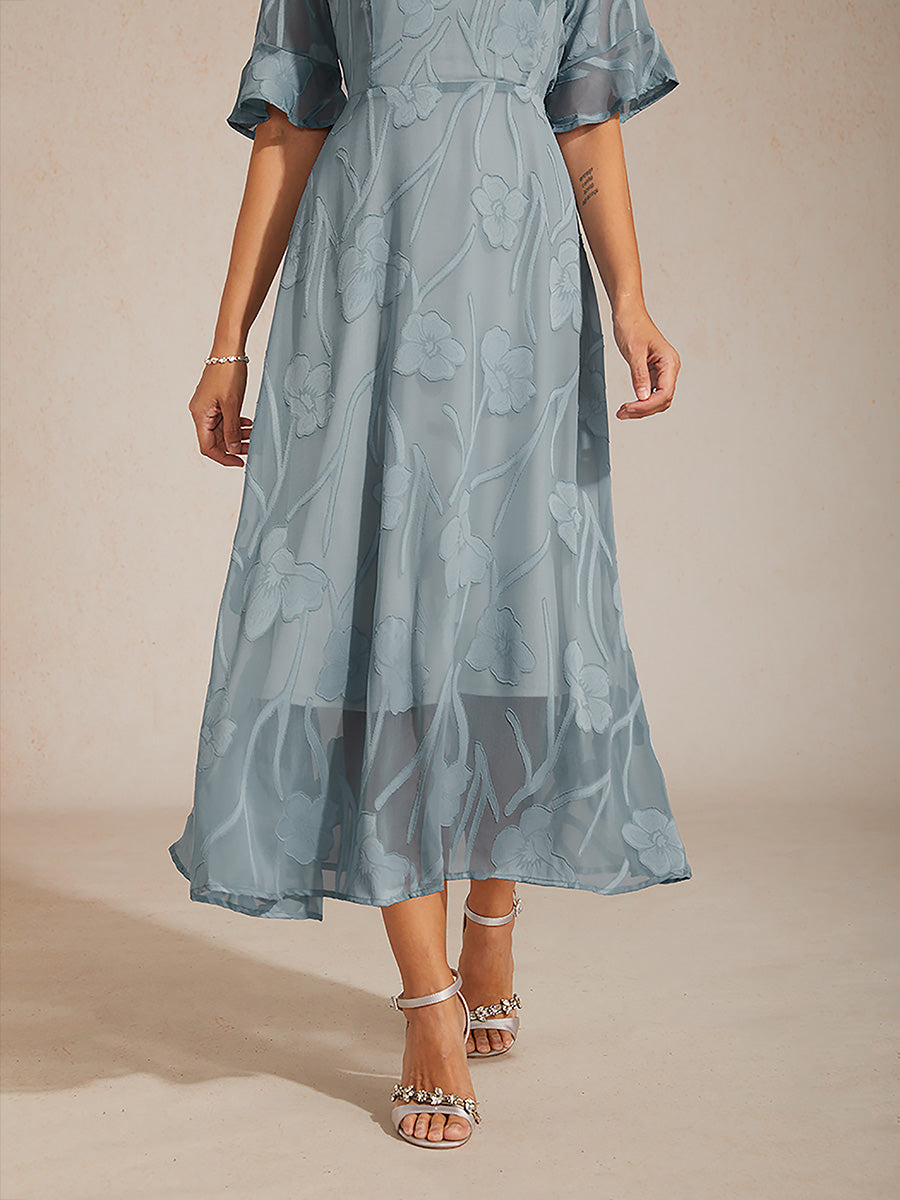 Maxikleid mit Rüschen und flatternder Spitze