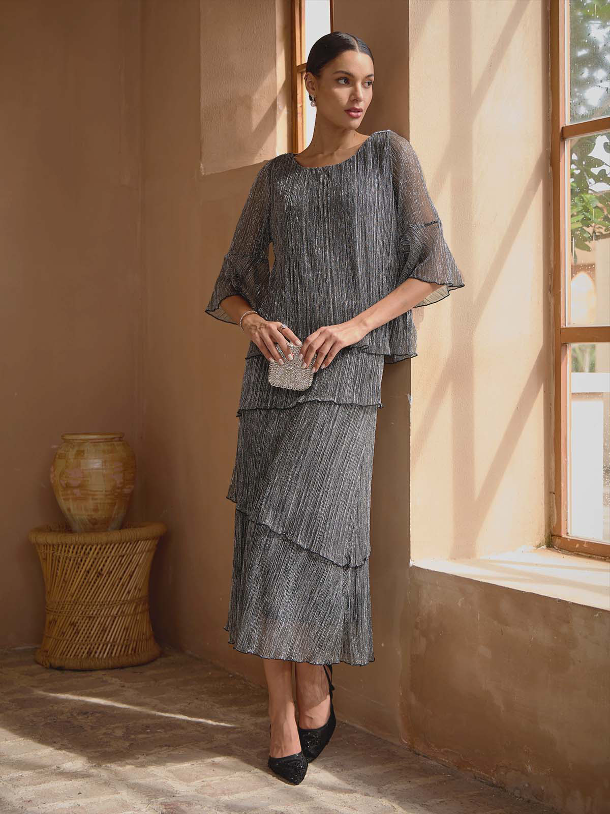 Blusa stratificata plissettata metallizzata