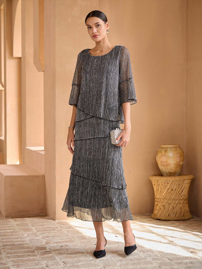 Blusa stratificata plissettata metallizzata